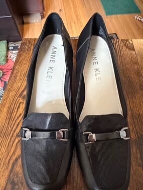 Anne Klein Black Textured Slip-On Loafers with Metal Accent